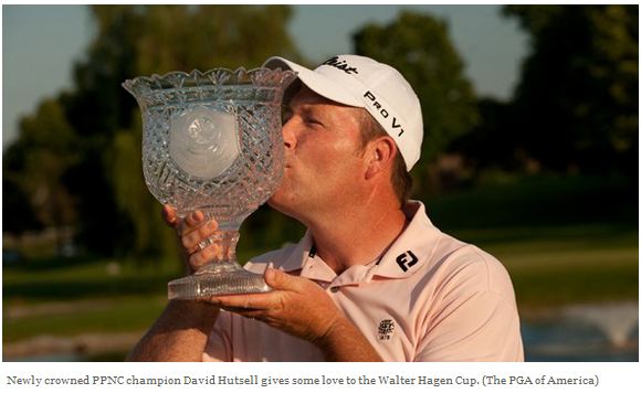 Newly crowned PPNC champion David Hutsell gives some love to the Walter Hagen cup. (The PGA of America)